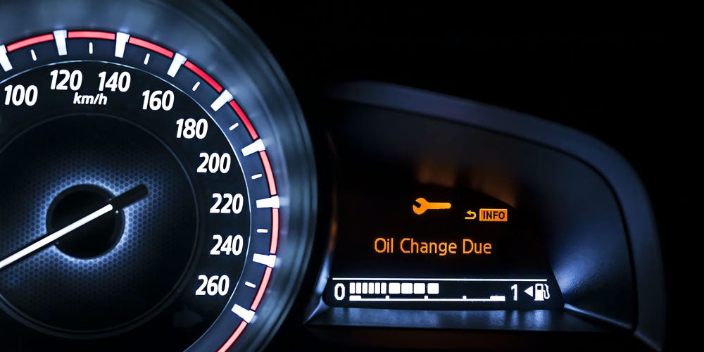 Vehicle dash displaying Oil Change Due message